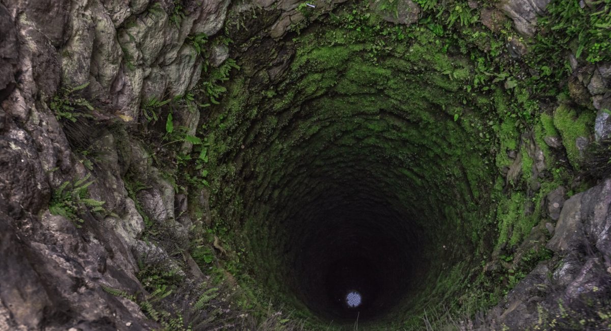 old deep well with moss